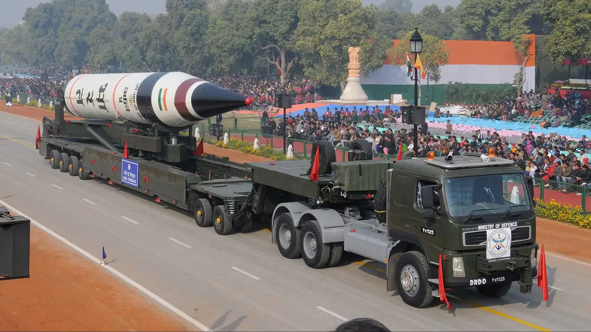 Launch of Agni-V missile from Abdul Kalam Island, demonstrating India's advanced ballistic capabilities.