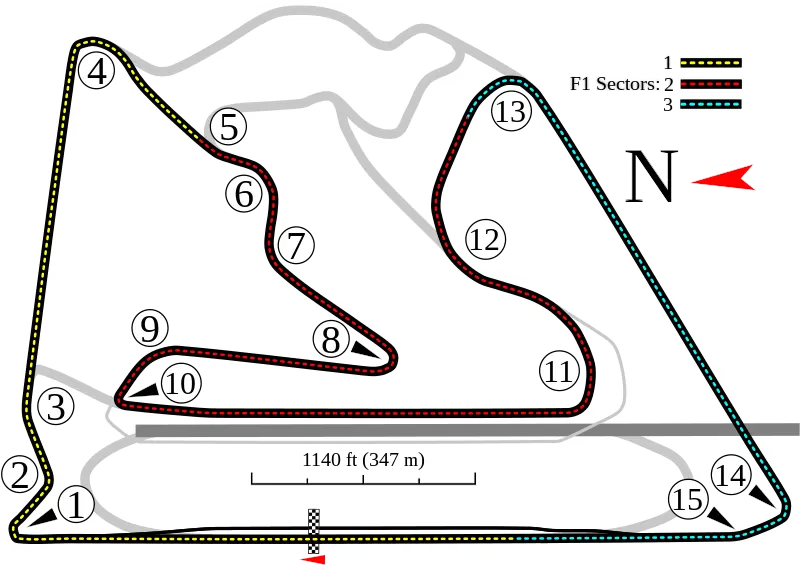 Fans cheering from the grandstands at the Bahrain International Circuit, capturing the electrifying atmosphere of the race.