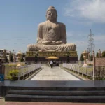 The majestic Mahabodhi Temple Complex, a UNESCO World Heritage Site in Bodhgaya, India, with intricate carvings and sculptures adorning its walls.