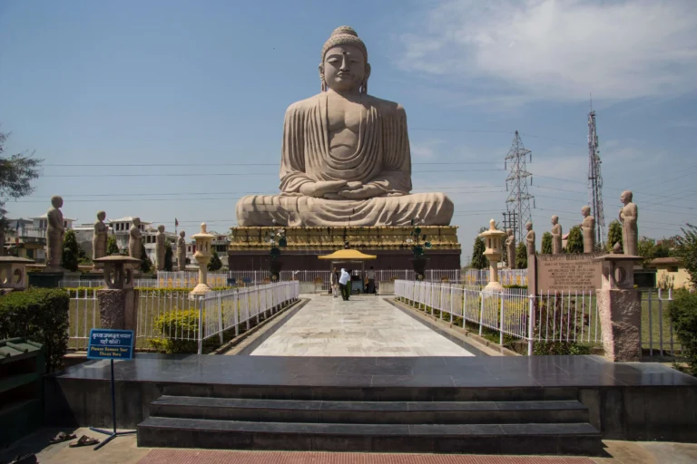 The majestic Mahabodhi Temple Complex, a UNESCO World Heritage Site in Bodhgaya, India, with intricate carvings and sculptures adorning its walls.