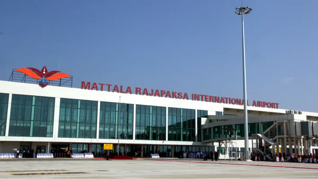 Aerial view of Hambantota Airport with cargo planes and passenger terminals, illustrating its strategic location and potential for economic growth.